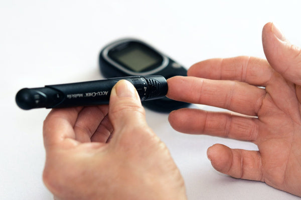 Checking on one's blood glucose with a glucose meter