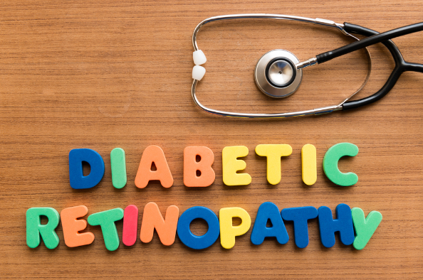 Diabetic retinopathy colorful medical word and stethoscope on the wooden background 